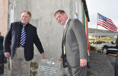 Emigrants Commemorative Centre: Mayor Martin Walsh unveiled a stone marker at the site of a planned Emigrant Commemorative Centre in Carna, Co. Galway. Máirtín Ó Catháin, the chairperson of the committee planning the centre, is shown at left. Photo by Bill Forry